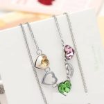  Lange Doppelkette, verziert mit Swarovski-Kristallen