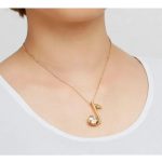  Halskette mit Musiknoten-Anhänger, verziert mit Swarovski-Kristallen