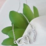  Ineinander verschlungene Doppelherz-Halskette, Rhodium