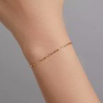 Ezüst karkötő, aranyszínű