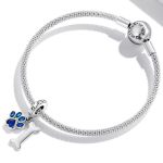 Silberanhänger, Pfote und Knochen, blau