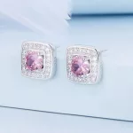 Silberne Damenohrringe mit lila Kristall