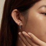 Silberne Ohrringe mit Teufelsaugen-Motiven