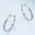 Silberne Ohrringe mit Teufelsaugen-Motiven