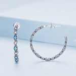 Silberne Ohrringe mit Teufelsaugen-Motiven