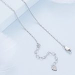 Silberne Halskette, dreifach, mit Anhänger