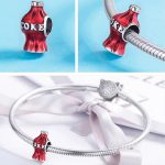 Ezüst charm, kólásüveg