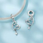 Ezüst charm, szív csillaggal