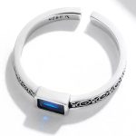 Silberner Damenring mit blauem Kristall