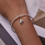 Silberanhänger, Rollschuhe