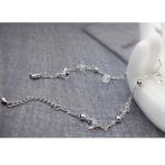  Perlenförmiges Steinarmband, verziert mit Swarovski-Kristallen