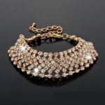  Vergoldetes Armband mit Kristallen, goldfarben, 17+6 cm