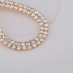  Vergoldete Ohrhänger mit Kristallen in Goldfarbe