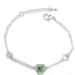  Armband mit Herzanhänger, Peridotgrün, verziert mit Swarovski-Kristallen