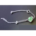  Armband mit Herzanhänger, Peridotgrün, verziert mit Swarovski-Kristallen