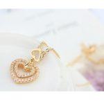 Doppelte herzförmige Halskette, funkelndes Gold