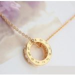 Halskette mit Ringanhänger, funkelndes Gold