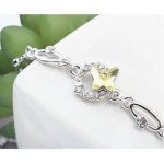 Schmetterlingsarmband, gelblich-weiß, verziert mit Swarovski-Kristallen