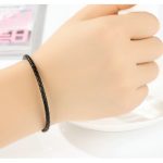 Geflochtenes Armband, Leder, schwarz, mit Silberverschluss, 18 cm