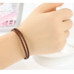 Geflochtenes Armband, Leder, braun, mit Silberverschluss, 40 cm