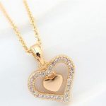 Doppelherz-Halskette, funkelndes Gold