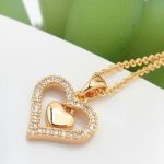 Doppelherz-Halskette, funkelndes Gold