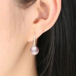 Silberohrringe mit Perlen, lila