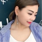 Dreieckige Ohrringe verziert mit Swarovski-Kristallen, Amethyst