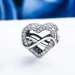 Ezüst charm, szív a végtelen jelével