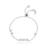 Silbernes Tennisarmband, verziert mit Mond und Sternen