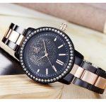 Damenarmbanduhr, mit Metallarmband, schwarz-roségold