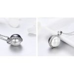 Silberne Halskette mit Perlenanhänger, schwarz und weiß