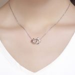 Silberne Halskette mit doppeltem Katzenkopf