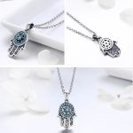 Silberne Halskette mit Hamsa-Anhänger, blauer Kristall