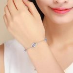 Silbernes Armband mit Teufelsaugen-Motiv