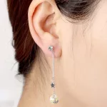 Ohrringe verziert mit Sternen und Swarovski-Kristallen, Pfirsich