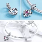  Silberner Herzanhänger mit Zirkonkristall, lila