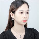 Set aus Schwanenhalskette und Ohrringen, verziert mit Swarovski-Kristallen, weiß