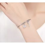 Silbernes Armband, Schloss und Schlüssel