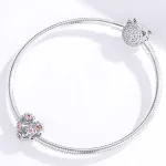 Silberanhänger mit durchbohrtem Herz, mehrfarbig