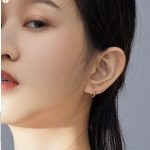 Silberne Creolen, funkelndes Gold