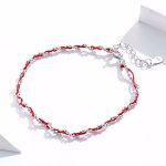 Ezüst karkötő zsinórral, piros