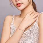 Ezüst karkötő piros szívvel