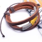 Dreifacharmband, Leder, gelb/grau, geschnürt