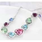  Herzförmiges Schmuckset, mehrfarbig, verziert mit Swarovski-Kristallen