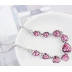  Herzförmiges Schmuckset, rosa, verziert mit Swarovski-Kristallen