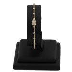 Armband aus 14-karätigem Gold mit Kristallen und Kugeln