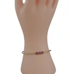 Dill aus 14-karätigem Gold mit rosa Kristallen