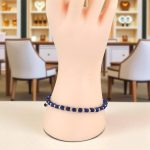 Uhrenarmband aus 14-karätigem Gold mit Perlen