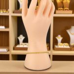 Armband aus 14-karätigem Gold mit klassischem Muster, abgeflachte Schale, 18 cm